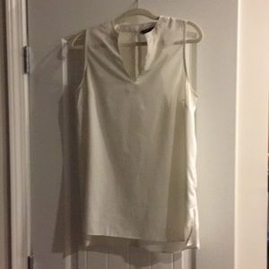 Sleeveless blouse, white.